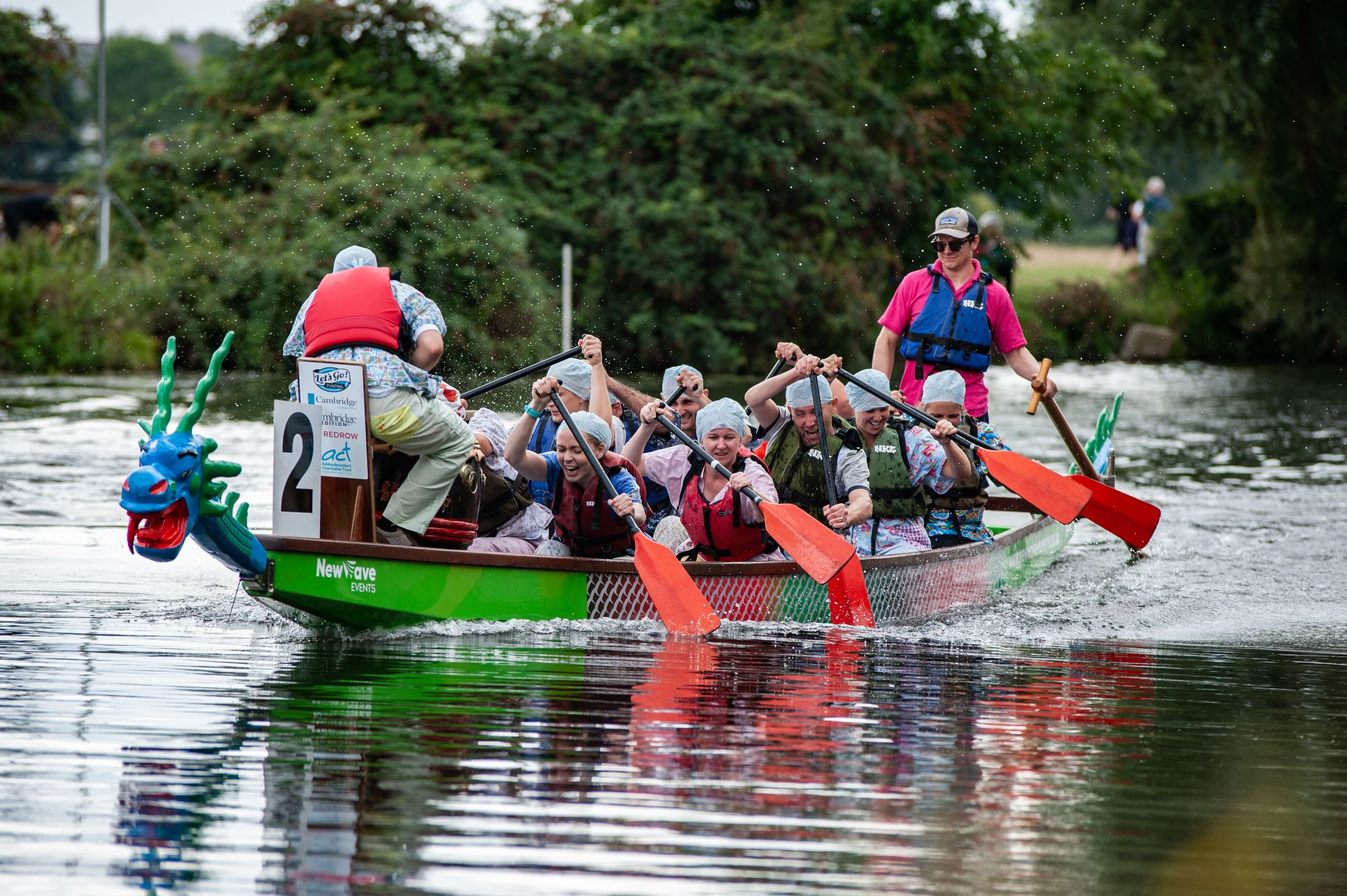 Cambridge dragon boat festival team on water